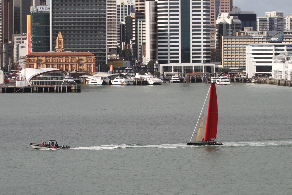 Passing downtown - Emirates Team NZ under tow - Wingsail test - 3 November 2011 photo copyright Richard Gladwell www.photosport.co.nz taken at  and featuring the  class