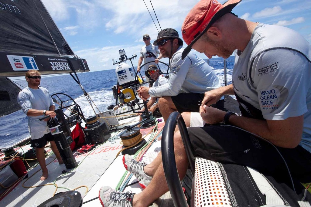 Life on deck during quieter times. PUMA Ocean Racing powered by BERG during Leg 1 of the Volvo Ocean Race 2011-12, from Alicante, Spain to Cape Town, South Africa. (Credit: Amory Ross/PUMA Ocean Racing/Volvo Ocean Race) photo copyright Amory Ross/Puma Ocean Racing/Volvo Ocean Race http://www.puma.com/sailing taken at  and featuring the  class