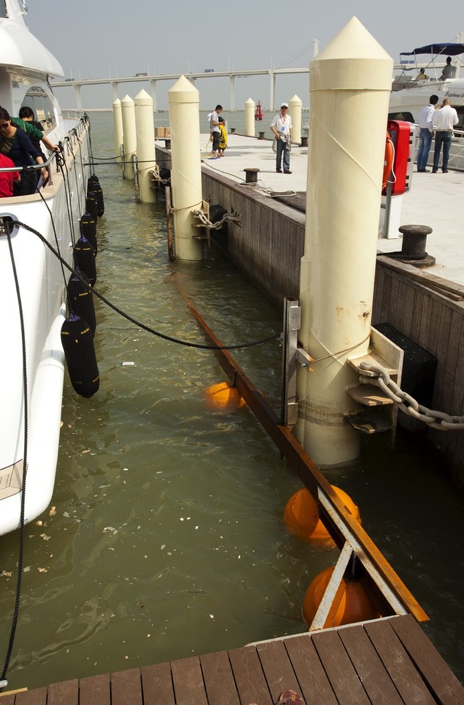 Macau Yacht Show 2011 - 28 October 2011 - pontoon fixtures that didn’t quite rise with the tide <br />
 © Guy Nowell http://www.guynowell.com