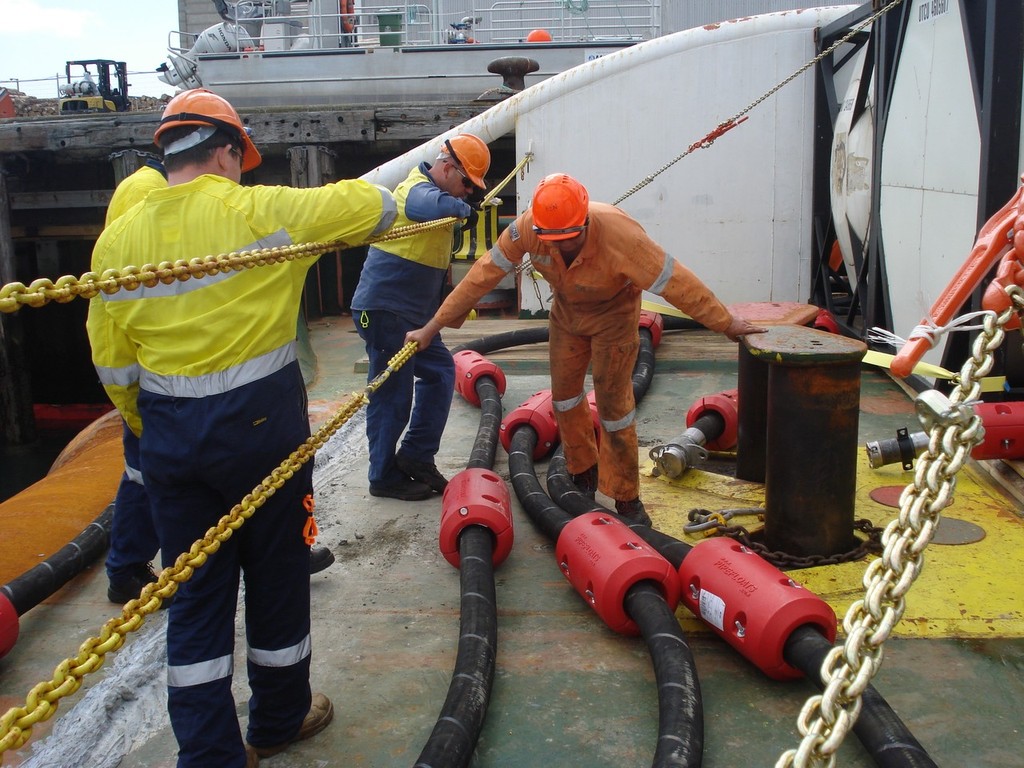 The new oil hose being prepared for pumping on board the Go Canopus. This is the hose that can enable direct pumping from the settling tanks and service tank. - Rena - 26 October 2011 © Maritime NZ www.maritimenz.govt.nz