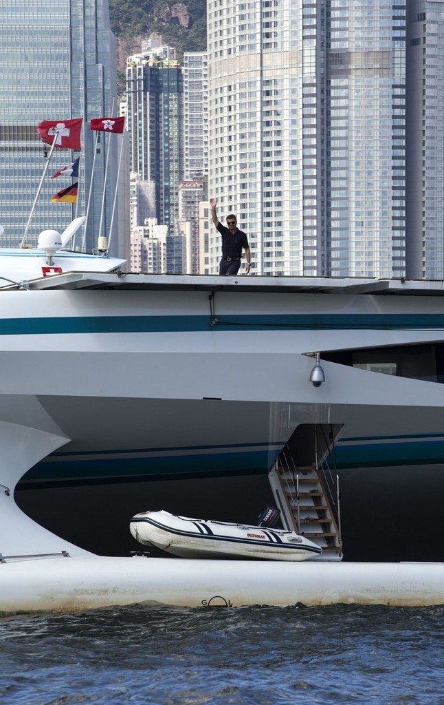 Capt Erwann Le Rouzic says goodbye to teh skyscrapers of Hong Kong. TURANOR PlanetSolar © Guy Nowell http://www.guynowell.com