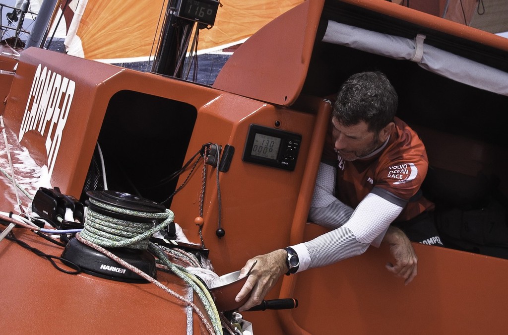 Rob Salthouse does his dishes with a pretty plentiful commodity onboard CAMPER with Emirates Team New Zealand  © Hamish Hooper/Camper ETNZ/Volvo Ocean Race