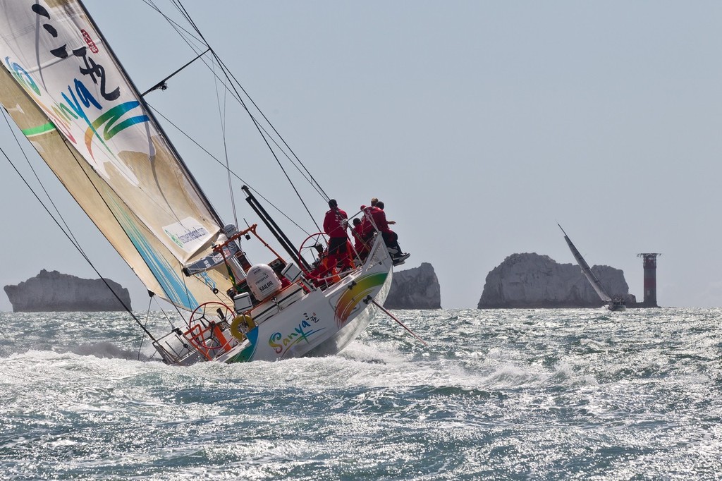 Team Sanya skippered by Mike Sanderson from New Zealand approaching The Needles at the start of the Rolex Fastnet Race. © Ian Roman/Volvo Ocean Race http://www.volvooceanrace.com