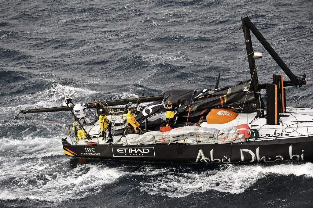 Abu Dhabi Ocean Racing’s yacht Azzam, skippered by Britain’s Ian Walker, returns to Alicante, Spain after the mast broke in rough weather on the first day of racing on leg 1 of the Volvo Ocean Race 2011-12.  © Paul Todd/Volvo Ocean Race http://www.volvooceanrace.com