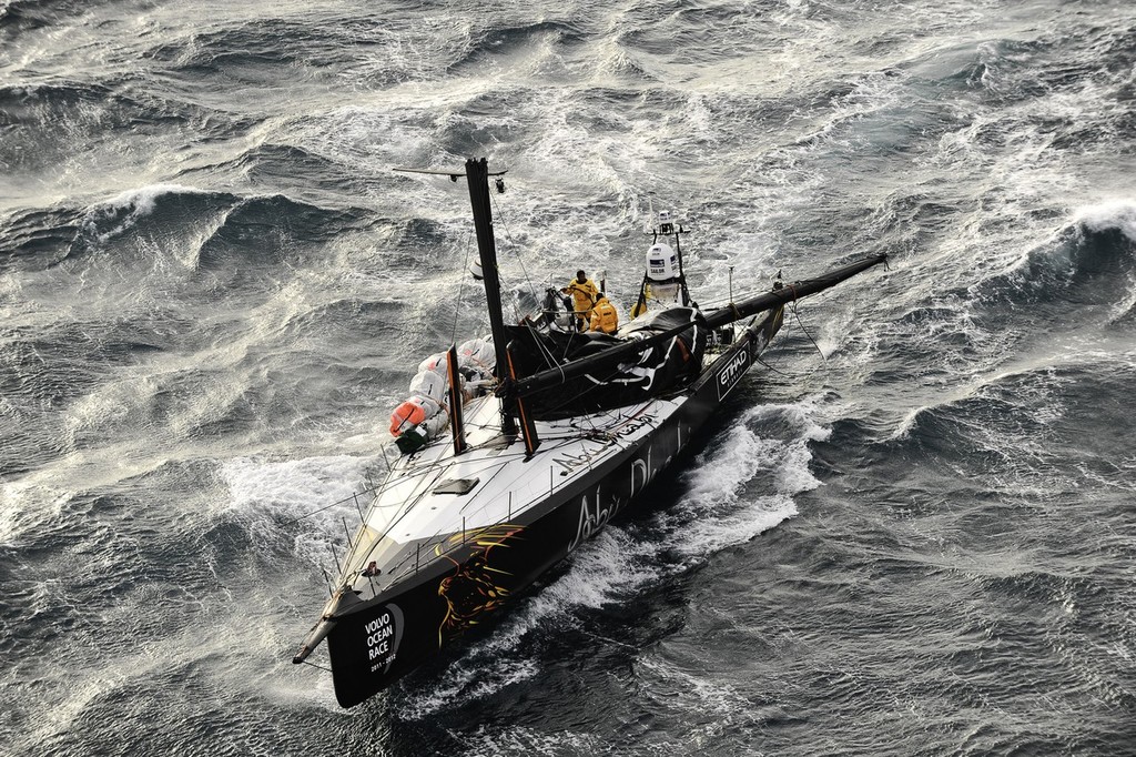 Abu Dhabi Ocean Racing’s yacht Azzam, skippered by Britain’s Ian Walker, returns to Alicante, Spain after the mast broke in rough weather on the first day of racing on leg 1 of the Volvo Ocean Race 2011-12.  © Paul Todd/Volvo Ocean Race http://www.volvooceanrace.com