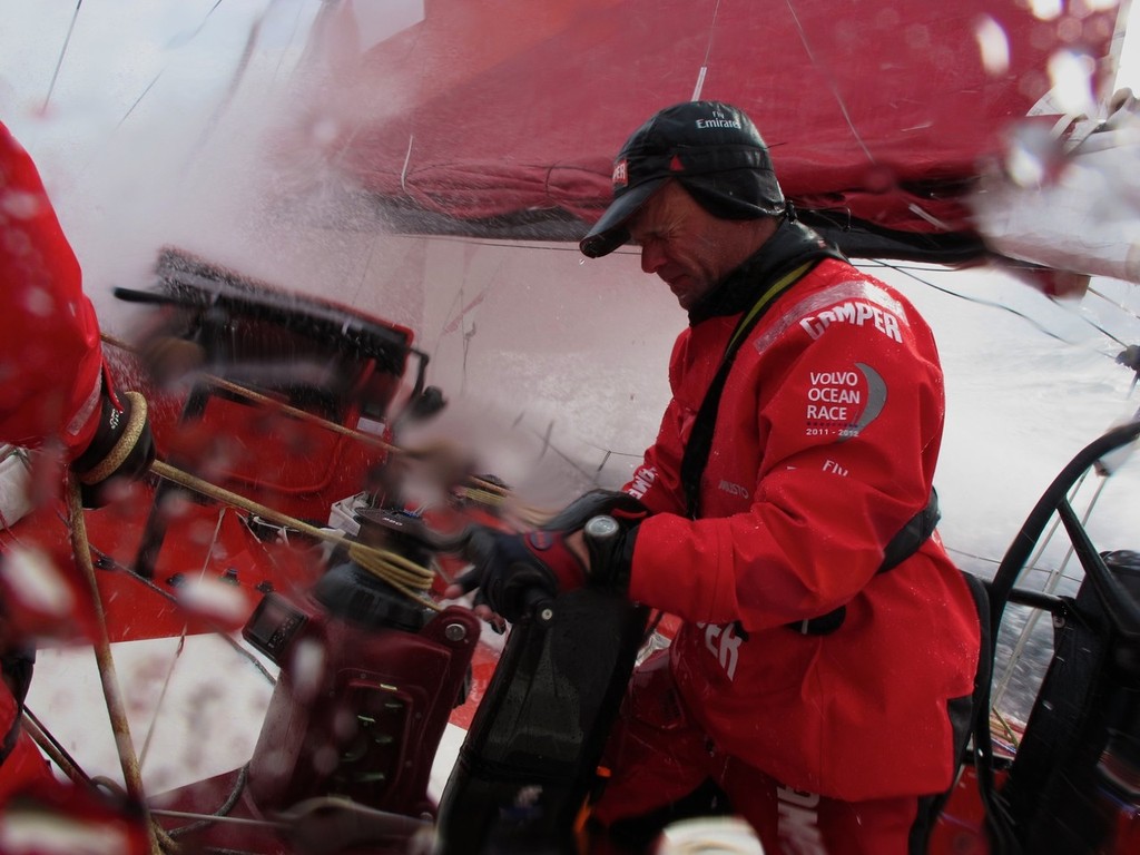 Chris Nicholson, Skipper of CAMPER enduring a very wet ride, during offshore testing. © Chris Cameron/ETNZ http://www.chriscameron.co.nz