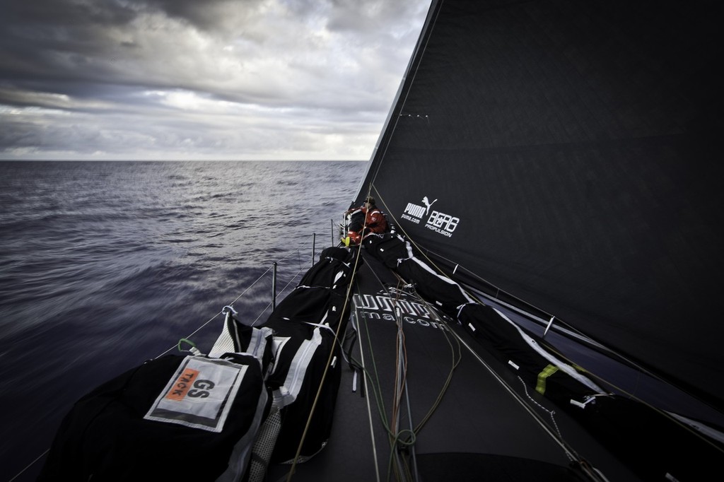 Casey Smith sitting in his office on the bow. PUMA Ocean Racing powered by BERG during leg 1 of the Volvo Ocean Race 2011-12 © Amory Ross/Puma Ocean Racing/Volvo Ocean Race http://www.puma.com/sailing