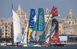 Fleet racing just metres away from the Race Village on day 3 of Act 6 in Trapani - Extreme Sailing Series 2011 photo copyright Lloyd Images http://lloydimagesgallery.photoshelter.com/ taken at  and featuring the  class