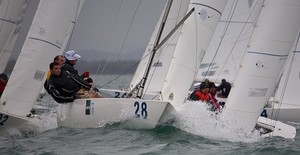 Close quarter racing for crewman Jamie Woods in the 2011 Etchells Winters photo copyright Kylie Wilson Positive Image - copyright http://www.positiveimage.com.au/etchells taken at  and featuring the  class