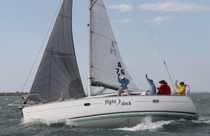 Jubilant at the finish, the team from Flight Deck with Michael Schmidt on the helm - Ensign Yachts QLD French Yacht Challenge and Beneteau Cup 2011 photo copyright Tracey Johnstone taken at  and featuring the  class