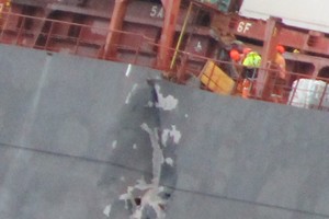 Close up of the port topside of the Rena showing the height that the forward part of the hull is above the after piece indicating failed structural integrity photo copyright Maritime NZ www.maritimenz.govt.nz taken at  and featuring the  class