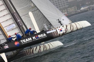 Team Korea fly a hull photo copyright ACEA - Photo Gilles Martin-Raget http://photo.americascup.com/ taken at  and featuring the  class