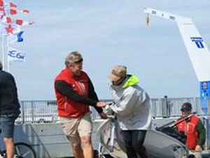 Paige Railey gets a hand at the boat ramp from High Performance Director/Head Coach Kenneth Andreasen - Weymouth and Portland International Regatta 2011 photo copyright USSTAG taken at  and featuring the  class