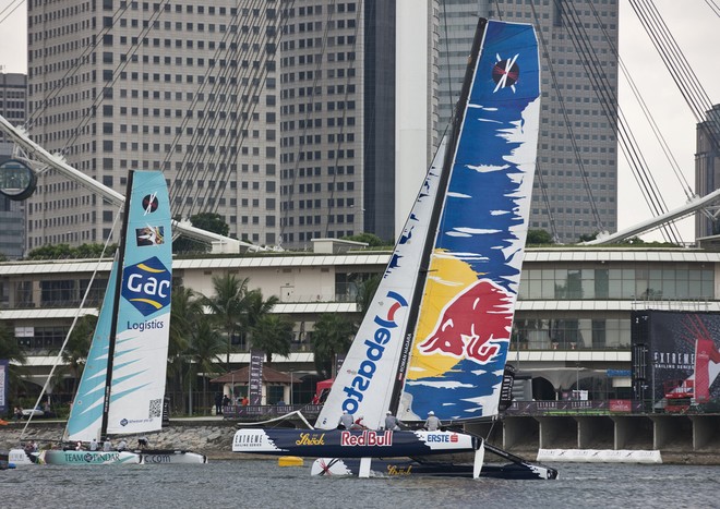Red Bull Extreme Sailing and Team GAC Pindar racing in front of the Race Village on day 3 - Act 9 Day 3 Extreme Sailing Series 2011 &copy; Lloyd Images http://lloydimagesgallery.photoshelter.com/