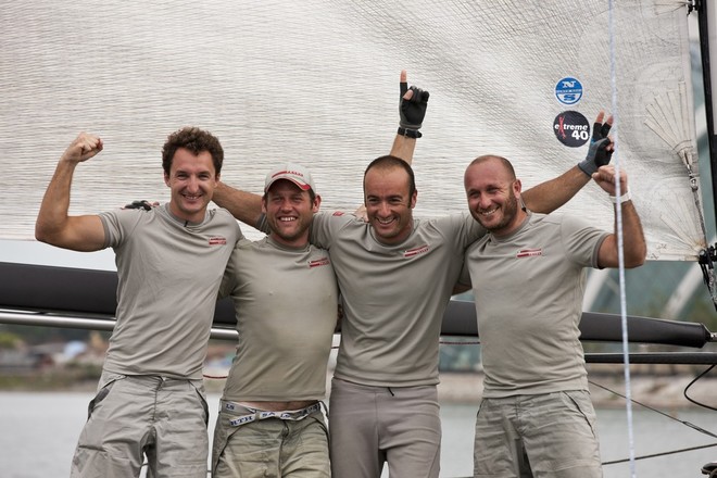 Luna Rosa celebrate after winning the regatta and the 2011 title - Extreme Sailing Series 2011. Act 9. Singapore © Lloyd Images http://lloydimagesgallery.photoshelter.com/