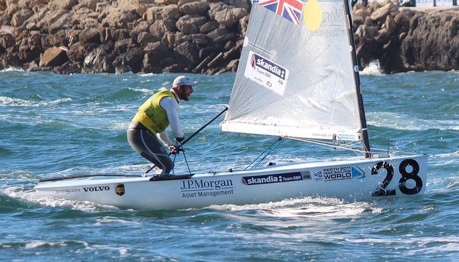 Ben Ainslie lets fly at the media boat as he enters the boat harbour Fremantle - ISAF World Sailing Championships © Robert Deaves/Finn Class http://www.finnclass.org