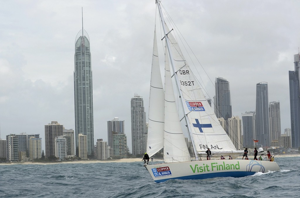 Visit Finland races past Surfers Paradise at the start of the race from the Gold Coast to Singapore in the Clipper 11-12 Round the World Yacht Race. © Steve Holland/onEdition