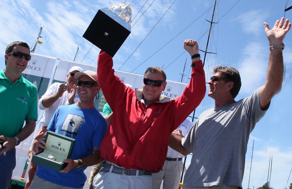 Loki crew with George Adams Trophy for overall handicap winnner. - Rolex Sydney Hobart Yacht Race 2011 © Crosbie Lorimer http://www.crosbielorimer.com