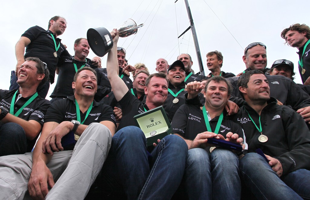 Anthony Bell holds the trophy aloft - Rolex Sydney Hobart Yacht Race 2011 © Crosbie Lorimer http://www.crosbielorimer.com