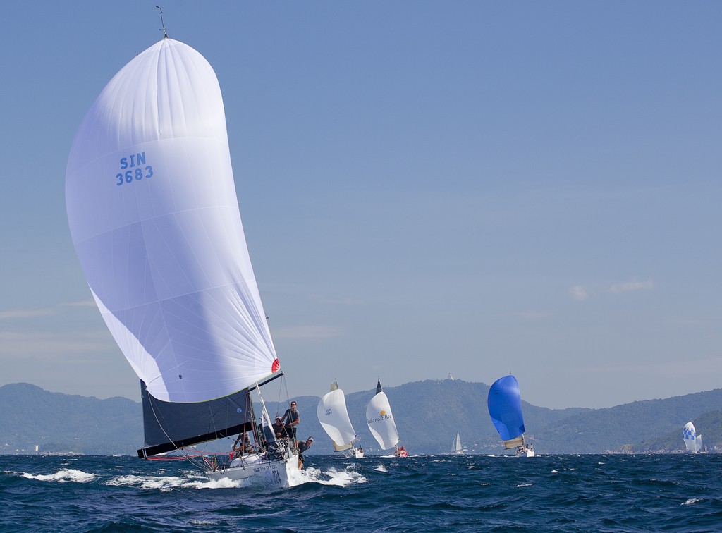 Phuket King’s Cup Regatta 2011 -   Foxy Lady 5, in the shadow of the Buddha © Guy Nowell http://www.guynowell.com