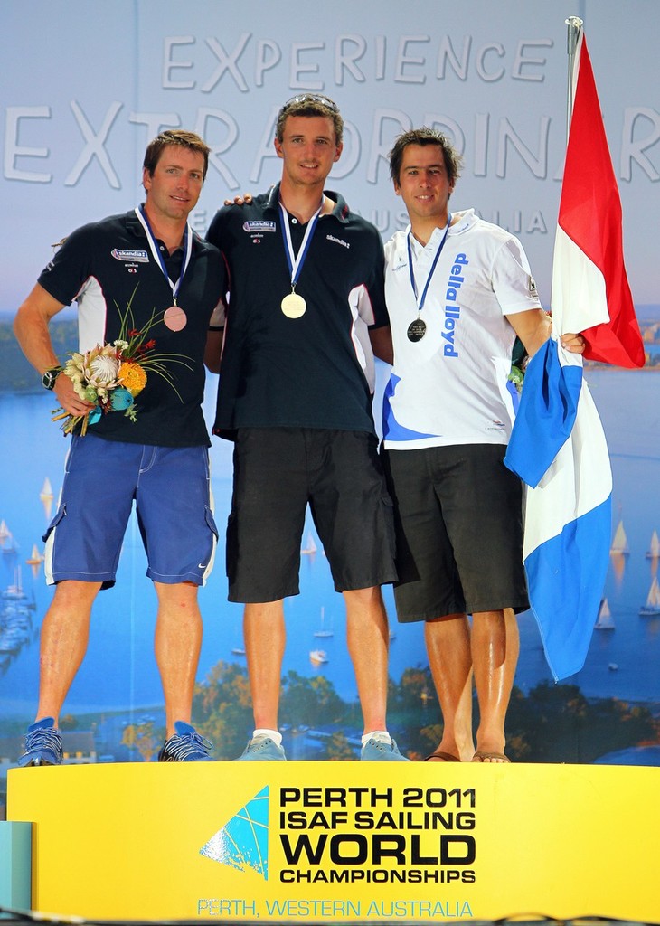 Ed Wright, Giles Scott, Pieter-Jan Postma, Medal ceremony December 11, 2011 off Fremantle, Australia. © Richard Langdon /Ocean Images http://www.oceanimages.co.uk