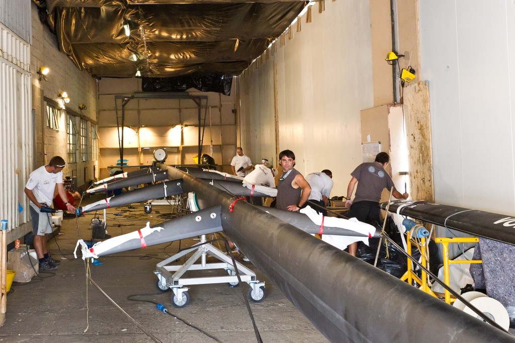 Abu Dhabi Ocean Racing shore crew working on the mast during the Volvo Ocean Race 2011-12 Cape Town stopover.  © Ian Roman/Volvo Ocean Race http://www.volvooceanrace.com