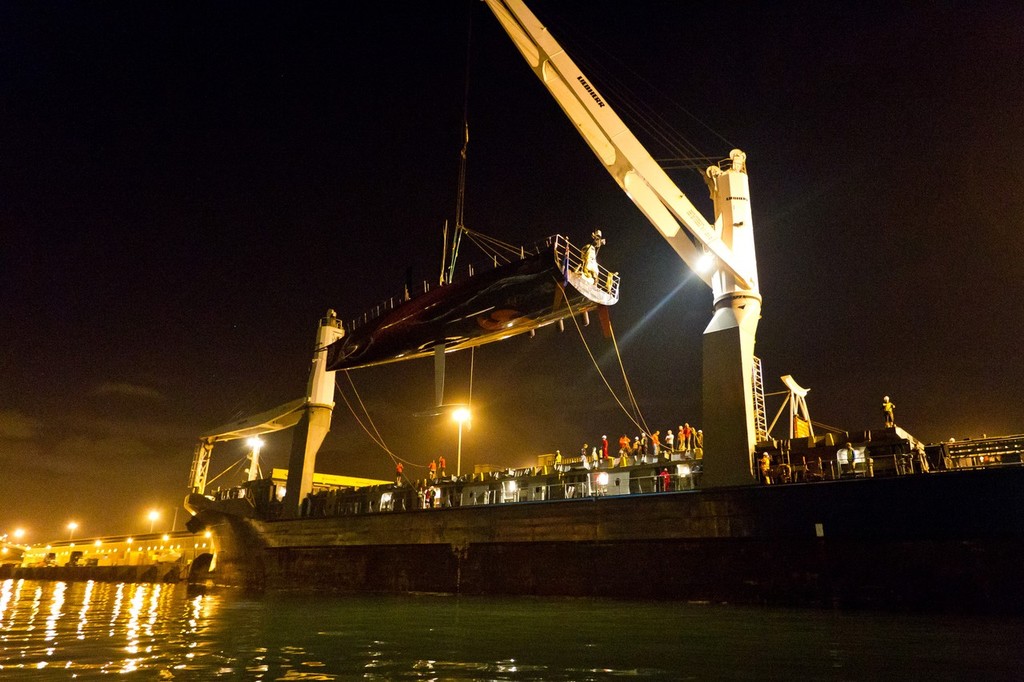 Container ship Team Bremen offloading Mar Mostro in Cape Town. © Ian Roman/Volvo Ocean Race http://www.volvooceanrace.com