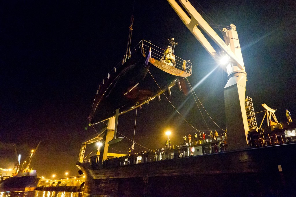 Container ship Team Bremen offloading Mar Mostro in Cape Town. © Ian Roman/Volvo Ocean Race http://www.volvooceanrace.com