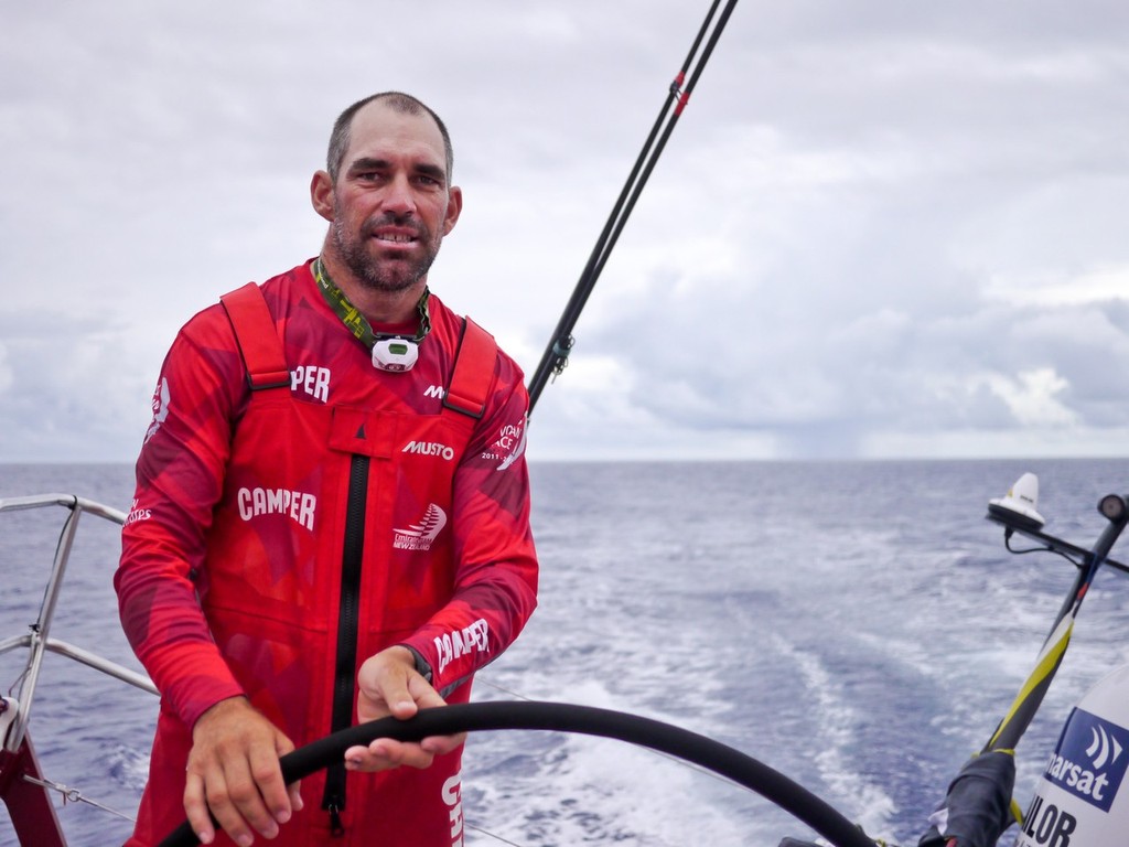 Stuart Bannatyne driving in the Doldrums with rain squall left behind onboard CAMPER with Emirates Team New Zealand during leg 2 of the Volvo Ocean Race 2011-12 © Hamish Hooper/Camper ETNZ/Volvo Ocean Race