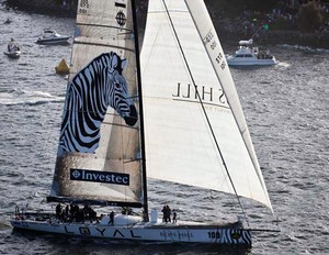 Investec Loyal takes the finish cannon - Rolex Sydney Hobart 2011 photo copyright  Rolex/Daniel Forster http://www.regattanews.com taken at  and featuring the  class