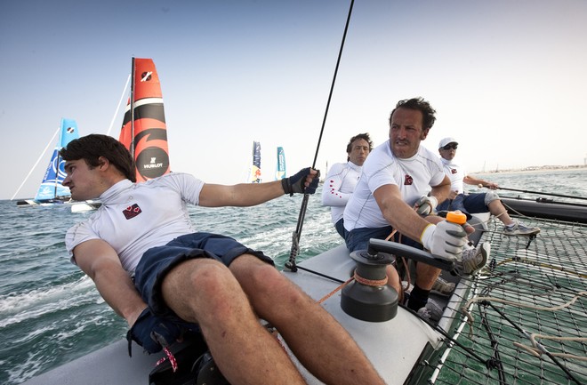 Day 3 - The crew working hard on board ZouLou - Extreme Sailing Series 2012. Act 1 &copy; Lloyd Images http://lloydimagesgallery.photoshelter.com/