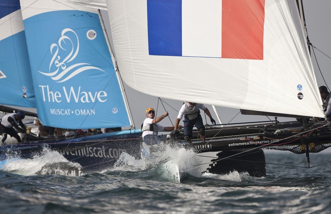 Day 3 - Loick Peyron at the helm of ZouLou with The Wave, Muscat chasing hard - Extreme Sailing Series 2012. Act 1 &copy; Lloyd Images http://lloydimagesgallery.photoshelter.com/