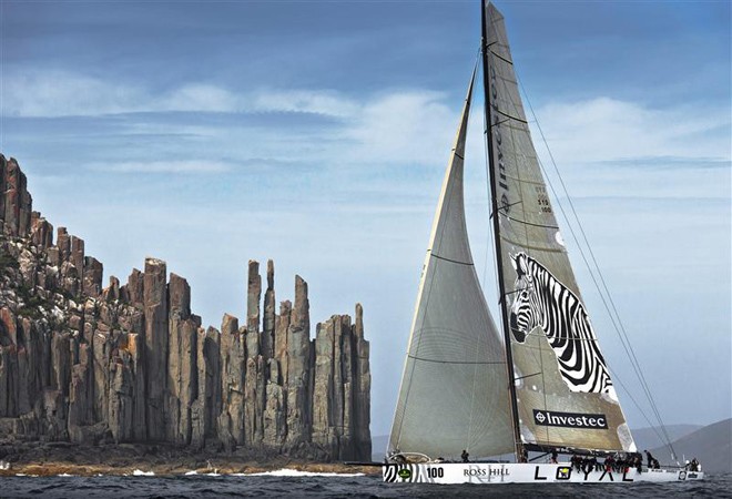 INVESTEC LOYAL passing Tasmania’s iconic Organ Pipes at Cape Raoul - Rolex Sydney Hobart Yacht Race 2011 ©  Rolex/ Kurt Arrigo http://www.regattanews.com