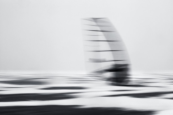 Hungarian olympian Laser sailor Zsombor Berecz (2008 Beijing - qualified 2012 London) ice surfing on the Lake Balaton. - Ice surfing on the Lake Balaton, Hungary © Gabor Turcsi