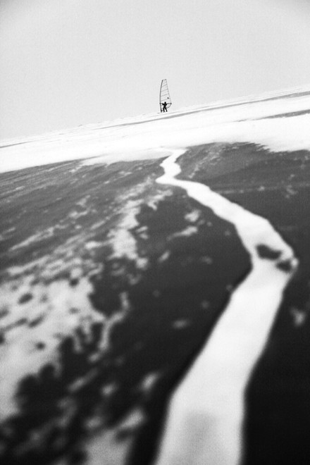 Hungarian olympian Laser sailor Zsombor Berecz (2008 Beijing - qualified 2012 London) ice surfing on the Lake Balaton. - Ice surfing on the Lake Balaton, Hungary © Gabor Turcsi