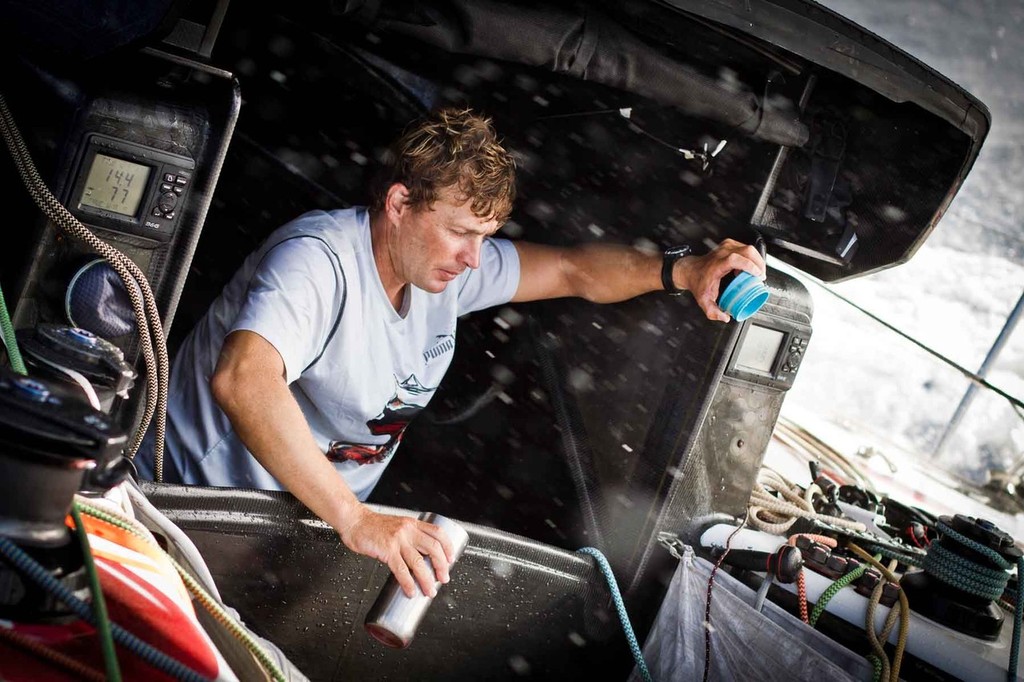 Coffee fiend Kelvin Harrap rinsing what’s left in his mug before a likely mid-watch refill. PUMA Ocean Racing powered by BERG during leg 4 of the Volvo Ocean Race 2011-12 © Amory Ross/Puma Ocean Racing/Volvo Ocean Race http://www.puma.com/sailing