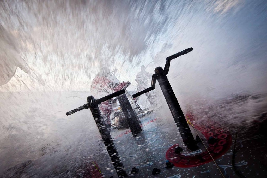 A canopy of water heads for the sailors on deck. PUMA Ocean Racing powered by BERG during leg 4 of the Volvo Ocean Race 2011-12, from Sanya, China to Auckland, New Zealand. (Credit: Amory Ross/PUMA Ocean Racing/Volvo Ocean Race) photo copyright Amory Ross/Puma Ocean Racing/Volvo Ocean Race http://www.puma.com/sailing taken at  and featuring the  class
