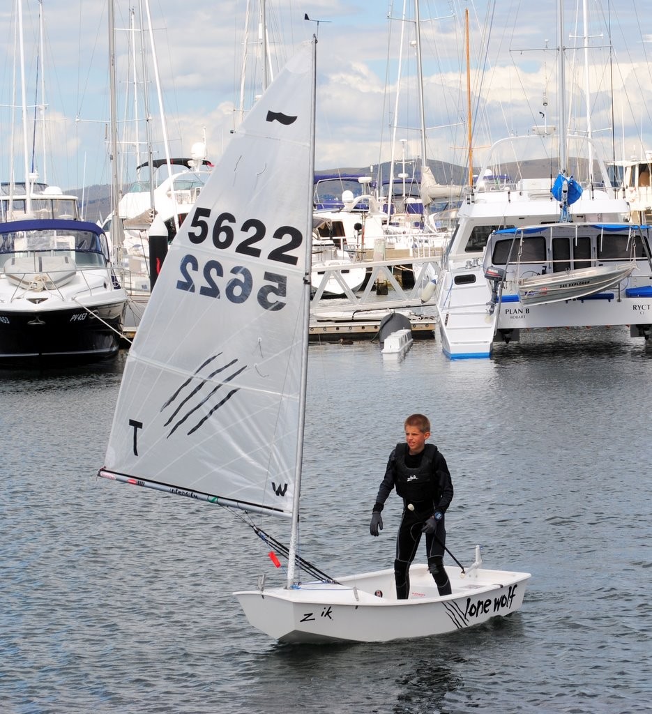 Angus Calvert sailing back into the Royal Yacht Club of Tasmania - Royal Hobart Regatta 2012 photo copyright Rob Cruse taken at  and featuring the  class