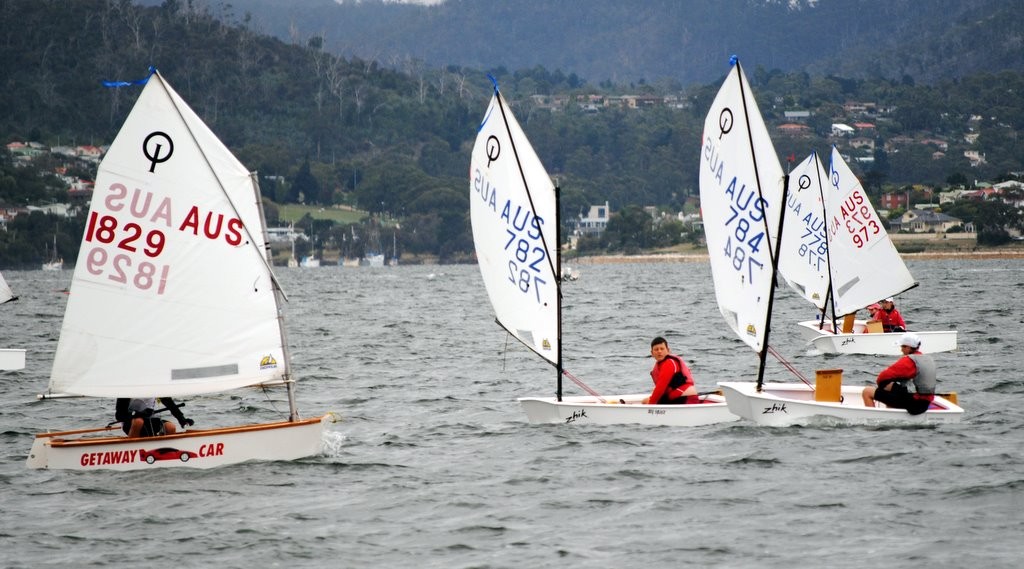 Joshua Harris (sail number 1829) from the Tamar Yacht Club leads a group of Sandy Bay sailors around the leeward mark including Alexander Potter (782), Damien Messmer (784) and Lily Zeeman (973) - Optimist Tasmanian Championship 2012 © Rob Cruse