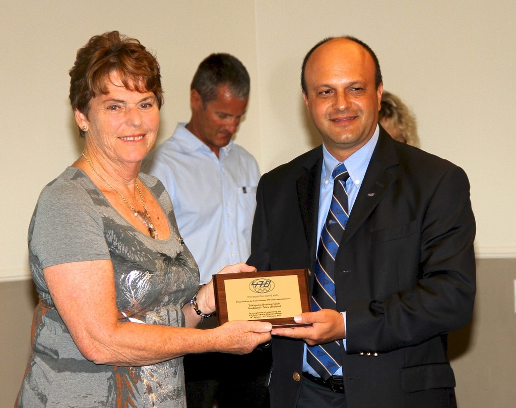 Event Director, Evelyn Johnson is presented with a plaque by Stanislav Kassarov Int 470 Class President - February 3, 2012 470 Junior Worlds photo copyright Richard Gladwell www.photosport.co.nz taken at  and featuring the  class