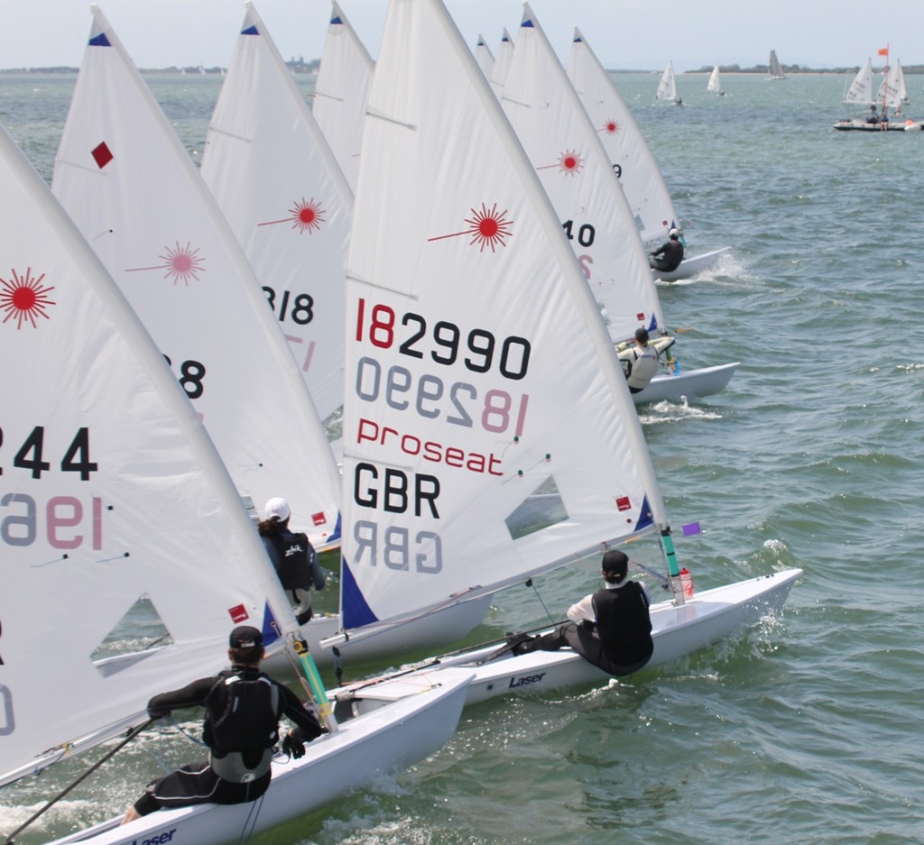 Ian Johnson GBR 990 leads Laser Radial Apprentice Masters fleet away on race 1 photo copyright Laser Masters Worlds Media 2012 http://www.lasersailing.com.au taken at  and featuring the  class