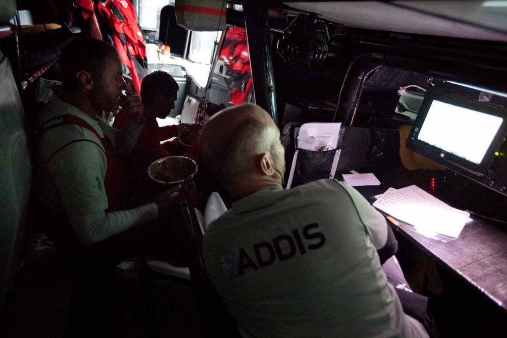 Social hour in the Nav station, where Tom Addis and Jono Swain discuss the days developments. PUMA Ocean Racing powered by BERG during leg 4 of the Volvo Ocean Race 2011-12, from Sanya, China to Auckland, New Zealand. (Credit: Amory Ross/PUMA Ocean Racing/Volvo Ocean Race) photo copyright Amory Ross/Puma Ocean Racing/Volvo Ocean Race http://www.puma.com/sailing taken at  and featuring the  class