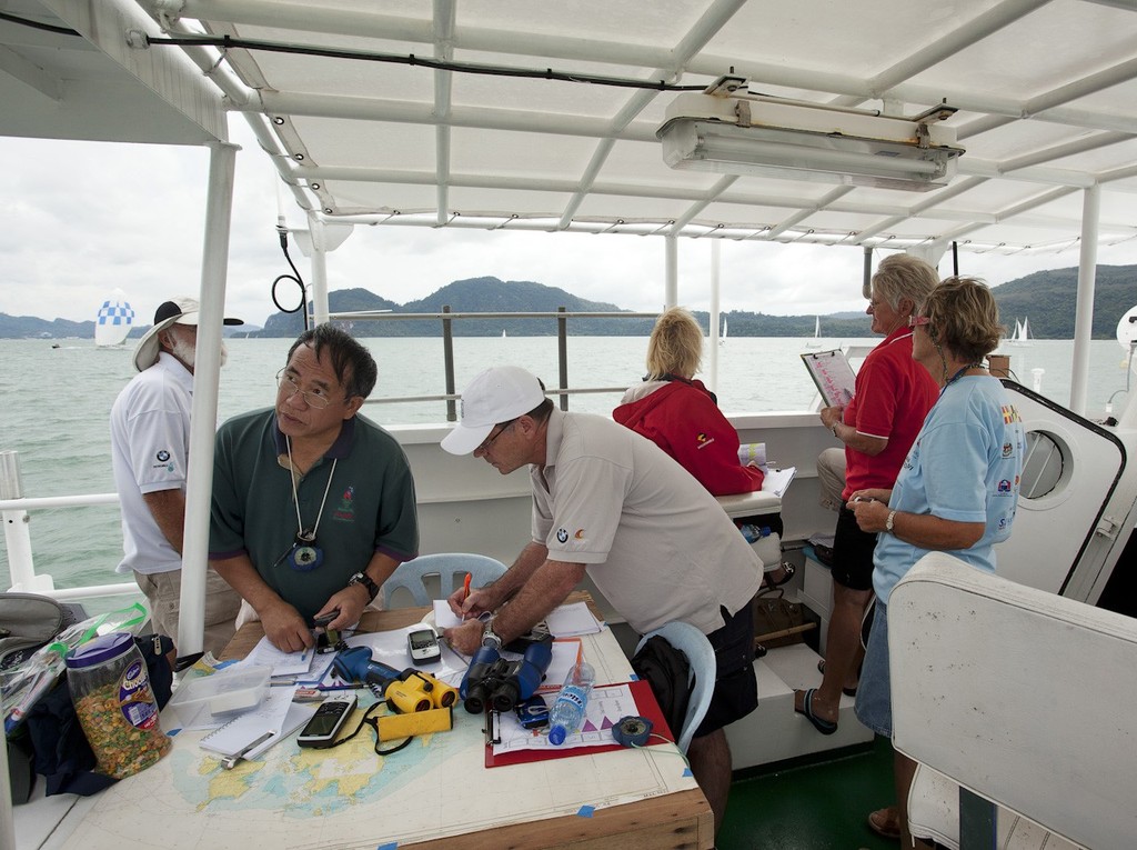 Royal Langkawi International Regatta 2012. Eyes down for a full house on the Committee Boat. photo copyright Guy Nowell http://www.guynowell.com taken at  and featuring the  class