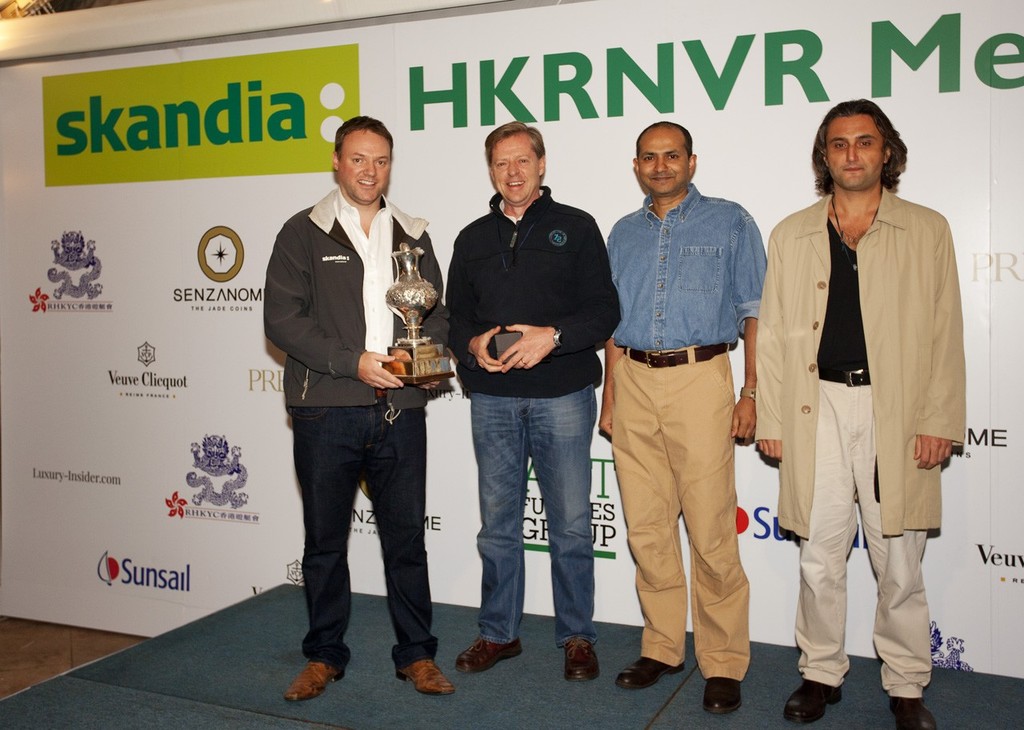Skandia HKRNVR Memorial Vase 2012 - winner Howard Williams (2nd left) receives the trophy. ©  RHKYC/Guy Nowell http://www.guynowell.com/
