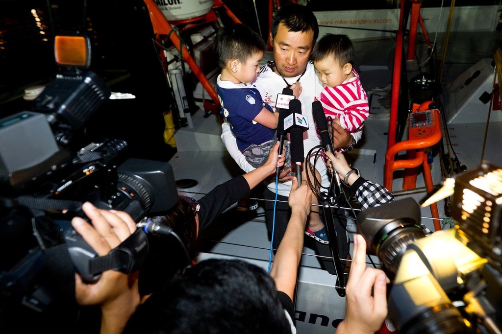 Teng Jiang He is interviewed on the dock. Team Sanya, skippered by Mike Sanderson from New Zealand finish sixth on leg 3 of the Volvo Ocean Race 2011-12 from Abu Dhabi, UAE, to Sanya, China. (Credit: IAN ROMAN/Volvo Ocean Race) photo copyright Ian Roman/Volvo Ocean Race http://www.volvooceanrace.com taken at  and featuring the  class