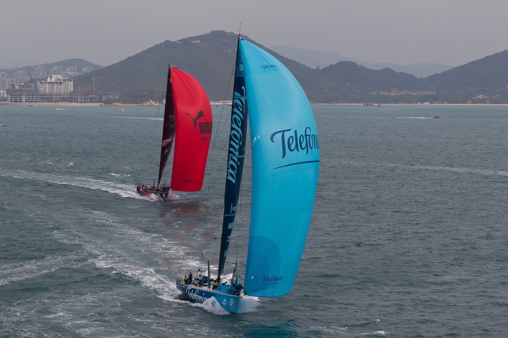 PUMA Ocean Racing powered by BERG, skippered by Ken Read from the USA chasing Team Telefonica, skippered by Iker Martinez from Spain, in the Sanya Haitang Bay In-Port Race, during the Volvo Ocean Race 2011-12. (Credit: IAN ROMAN/Volvo Ocean Race) © Ian Roman/Volvo Ocean Race http://www.volvooceanrace.com