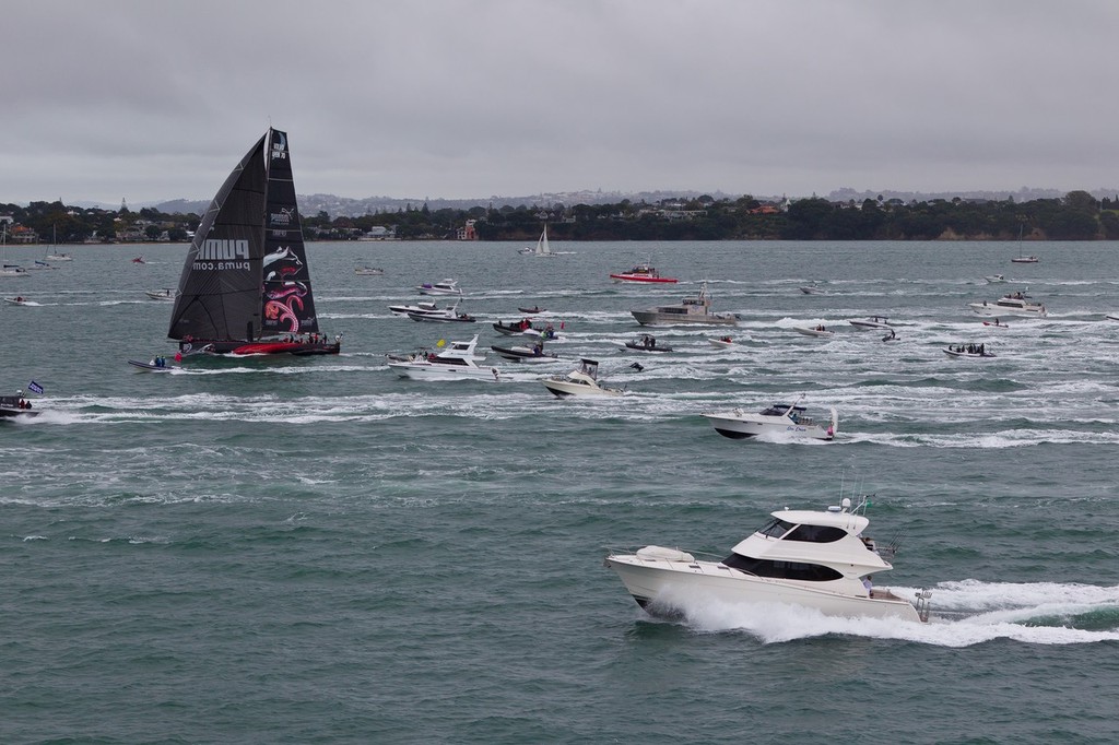 PUMA Ocean Racing powered by BERG, skippered by Ken Read from the USA is followed by spectator boats as they take second place on leg 4 in Auckland, during the Volvo Ocean Race 2011-12.  © Ian Roman/Volvo Ocean Race http://www.volvooceanrace.com