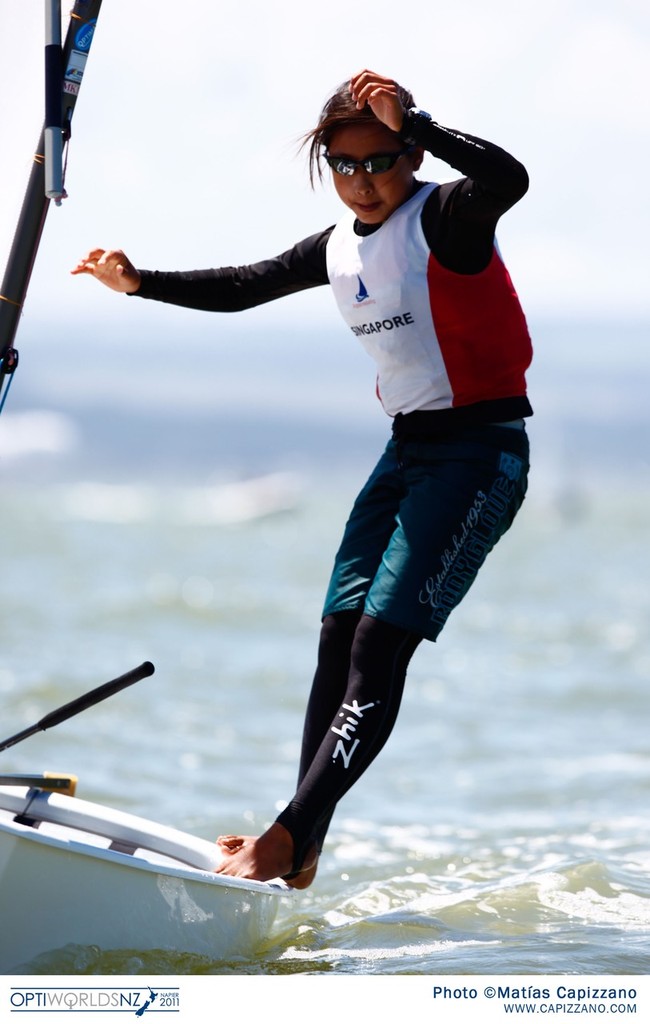 Kimberly Lim (SIN) 2011 World Optimist Champion photo copyright Matías Capizzano/Optiworlds http://www.capizzano.com/ taken at  and featuring the  class