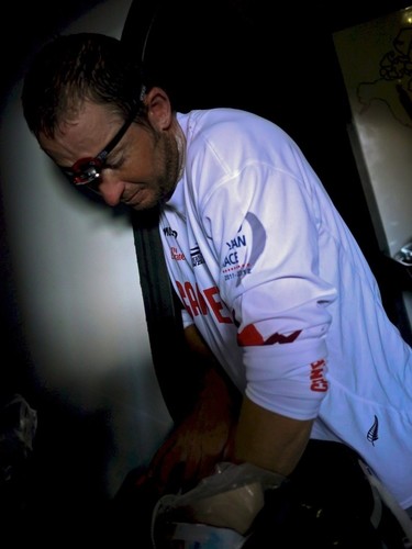 Andrew McLean with his hands in the food bag onboard Camper C during leg 4 of the Volvo Ocean Race 2011-12, from Sanya, China to Auckland, New Zealand.  © Hamish Hooper/Camper ETNZ/Volvo Ocean Race