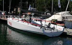 Dee Smith grabs a bit of Vitamin D before we go sailing. Solid chines very evident in hull form. - Farr 400 photo copyright  John Curnow taken at  and featuring the  class